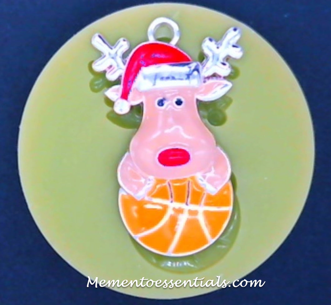 Silicone Mold Christmas Reindeer with Santa Hat and antlers holding a basketball pin jewelry wax, gypsum, resin, hot glue, soap, clay, metal