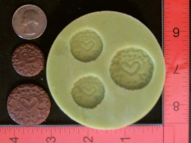 Silicone Mold Medallion Heart used with wax, Candle, gypsum, resin, hot glue, soap, clay, concrete, metal