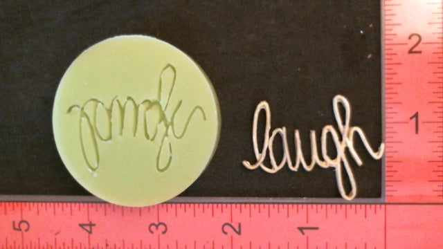 Silicone Mold word Laugh used with wax, gypsum, resin, hot glue, soap, clay, metal
